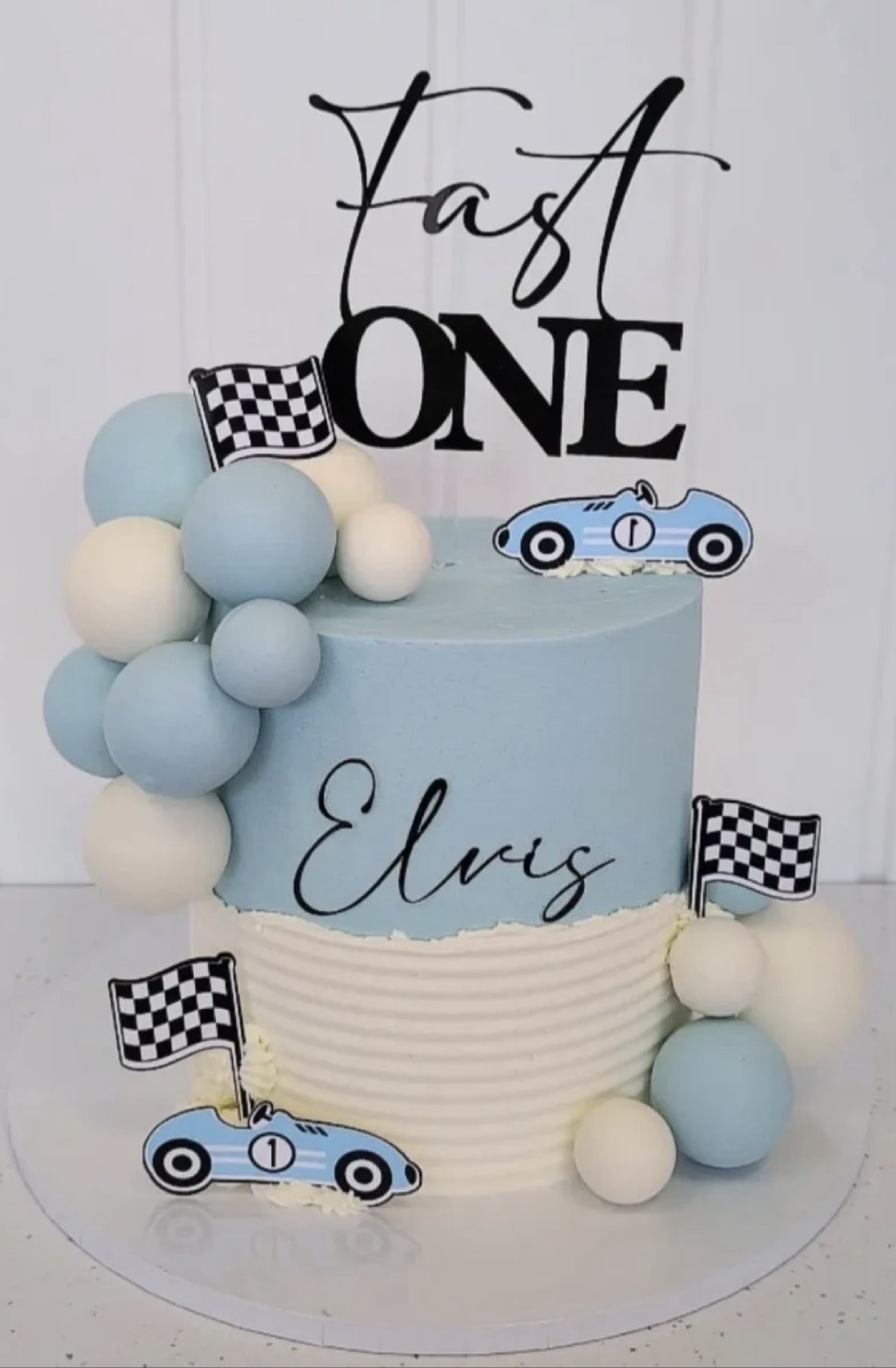 Race car first birthday cake